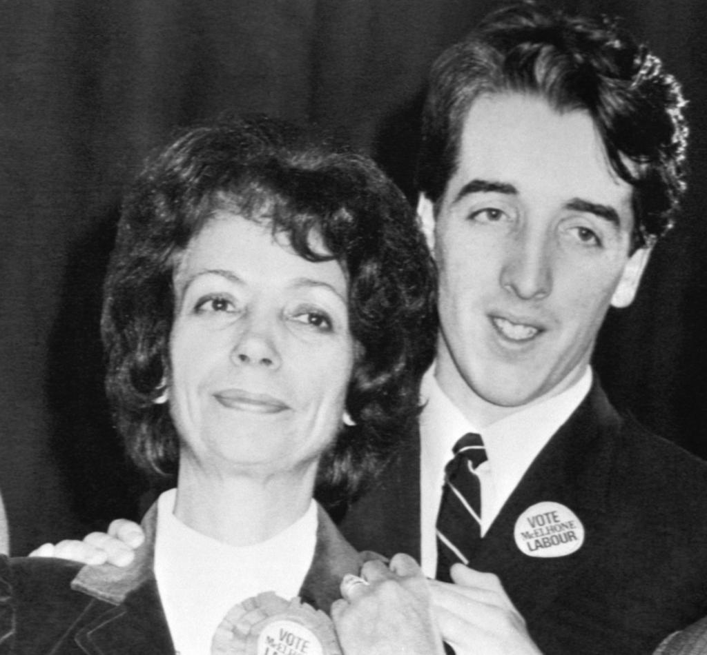 Photograph of Helen McElhone and an unidentified man